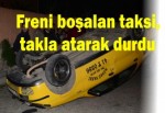 Freni boşalan taksi, takla atarak durdu