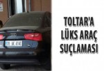 Toltar'a lüks araç suçlaması